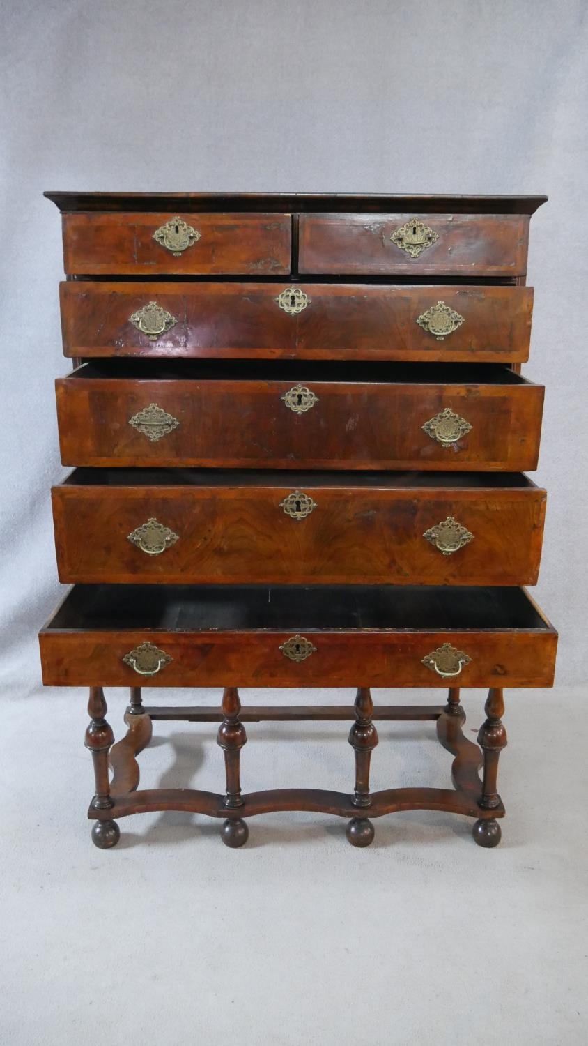 A Queen Anne walnut and feather banded chest on stand with two short and three long graduated - Image 2 of 12