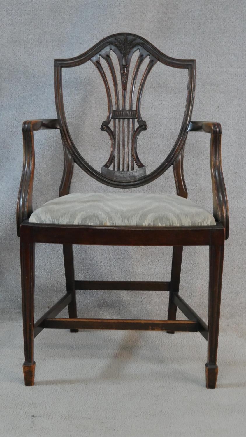 A set of eight Hepplewhite style mahogany shield back dining chairs with drop in seats on square - Image 8 of 9