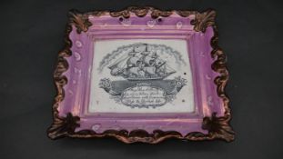 An antique pink Sunderland lustre ceramic plaque with galleon and 'May Peace & Plenty on our