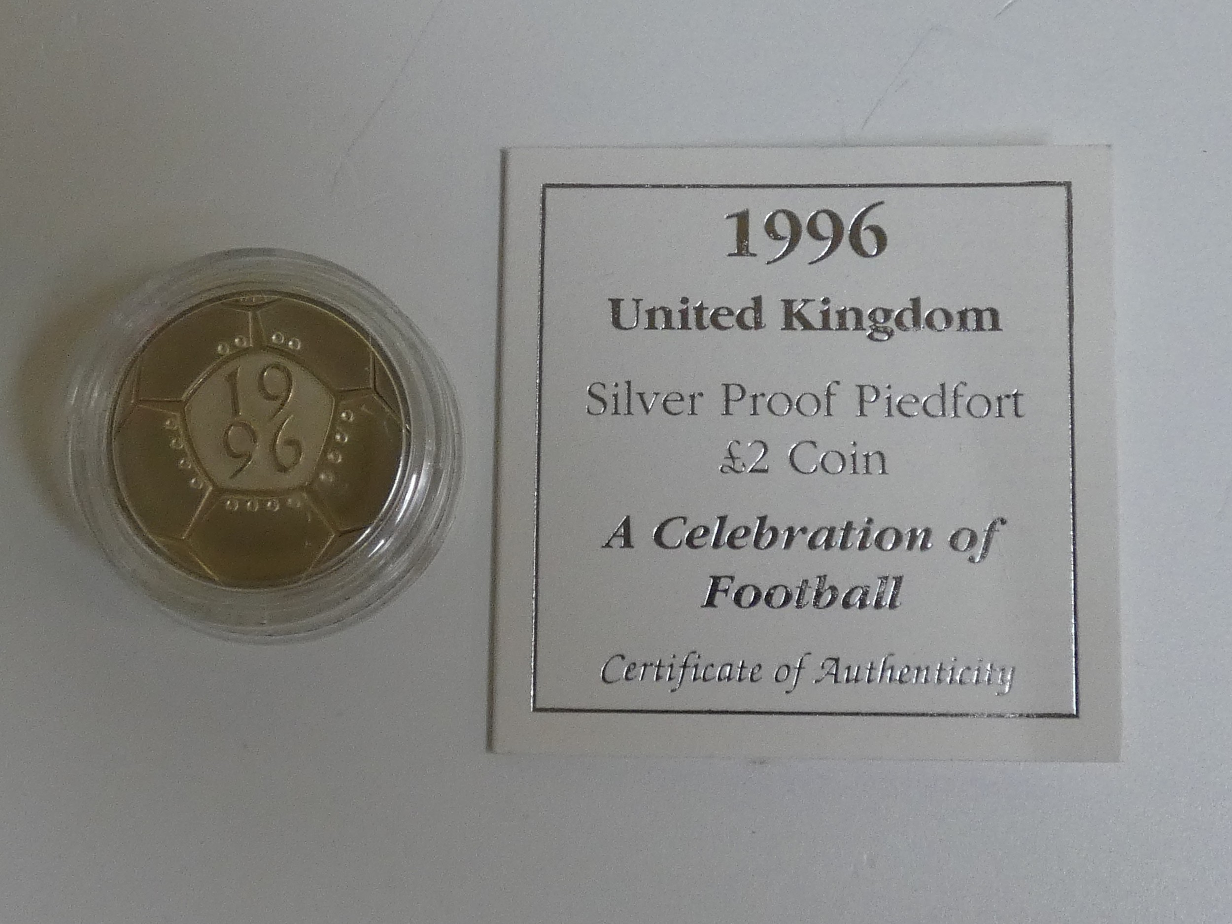 Three silver proof coins. A 1996 Royal Mint silver proof Piedfort "A Celebration of Football" two - Image 3 of 5