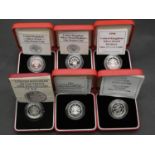 Six Royal Mint silver proof one pound coins. Four silver proof Piedfort one pound coins all in red