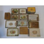 A miscellaneous collection of thirteen vintage Cuban cigar boxes, various brands. H.8 L.15 W.21cm