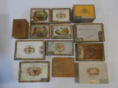 A miscellaneous collection of thirteen vintage Cuban cigar boxes, various brands. H.8 L.15 W.21cm