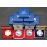 Ten Royal Mint silver proof coins. Including eight cased silver proof 1997 crowns with COA's, a