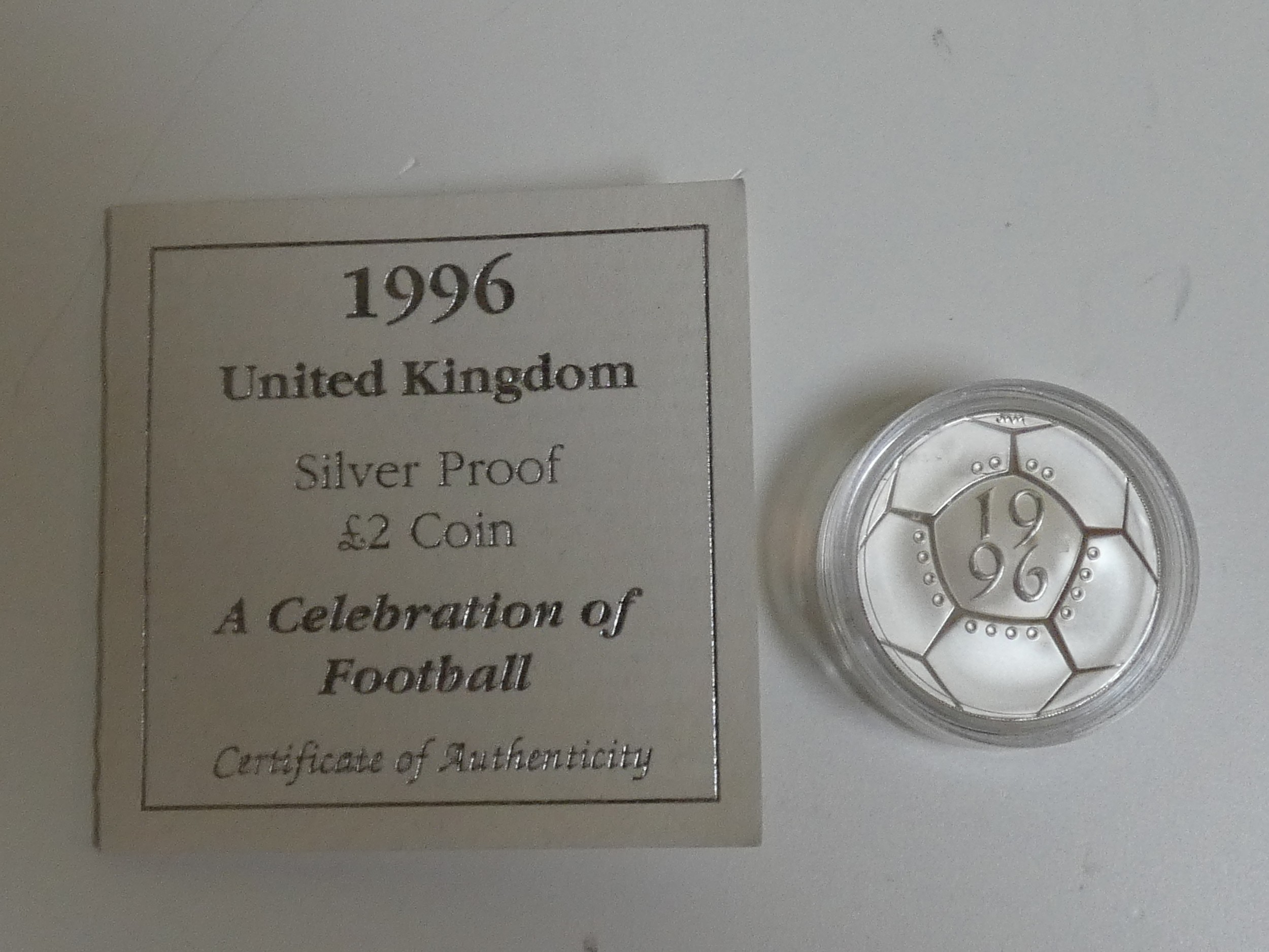 Three silver proof coins. A 1996 Royal Mint silver proof Piedfort "A Celebration of Football" two - Image 5 of 5