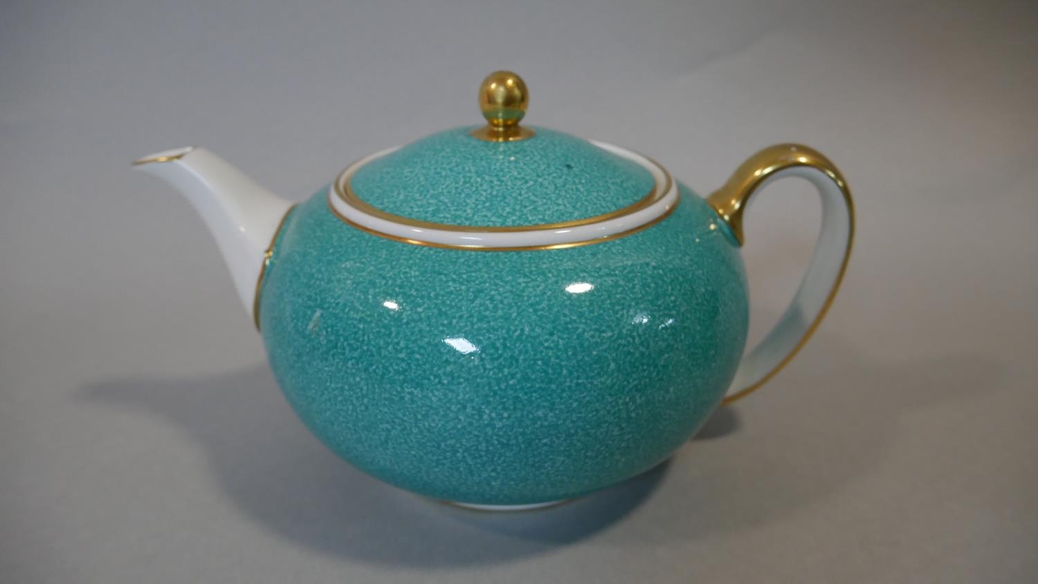 A part six person Wedgwood tea service. The set has a dappled turquoise and gilt design. Makers - Image 3 of 6