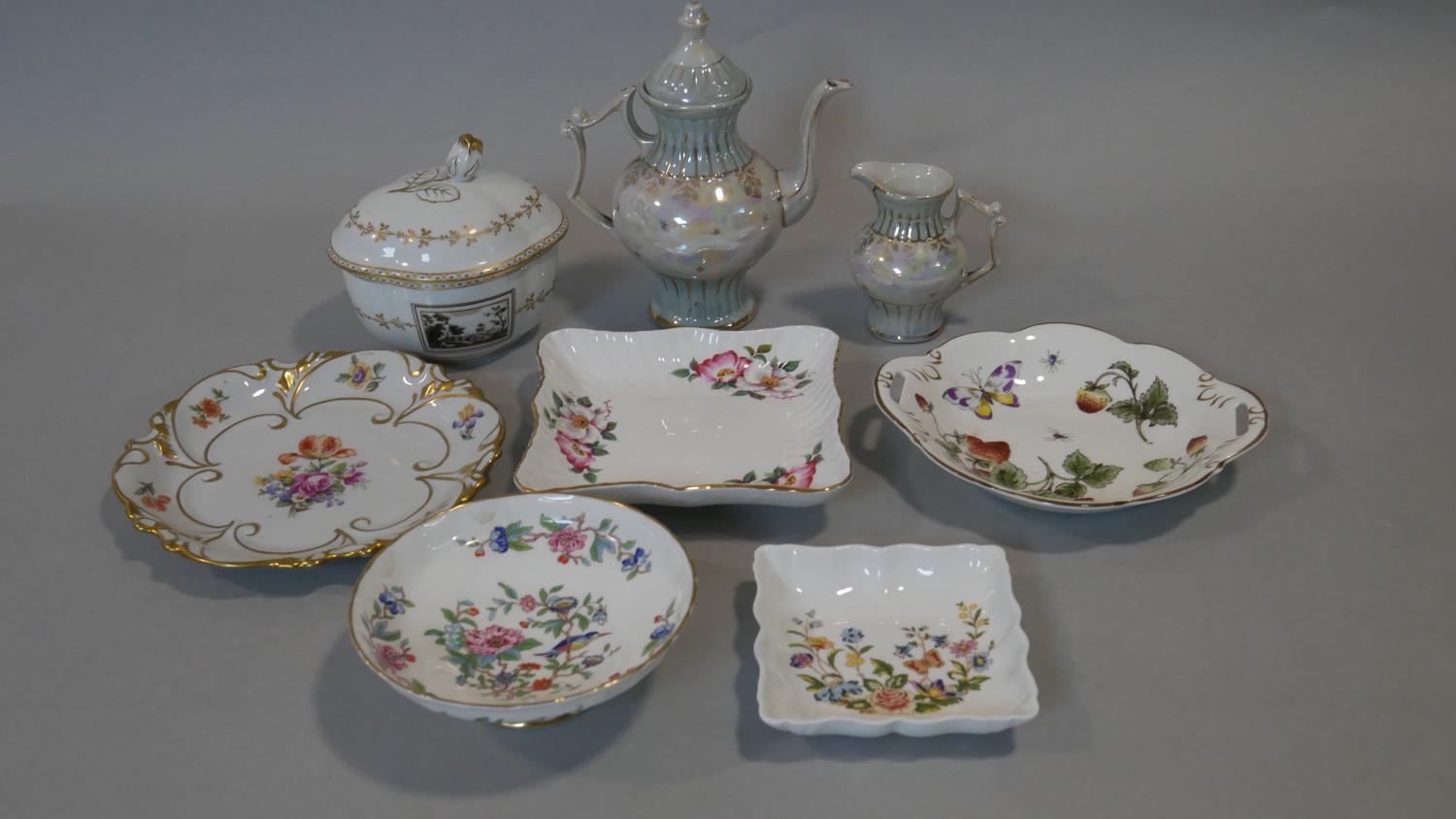 A collection of hand painted fine bone china. Including a lustre coffee pot with matching milk