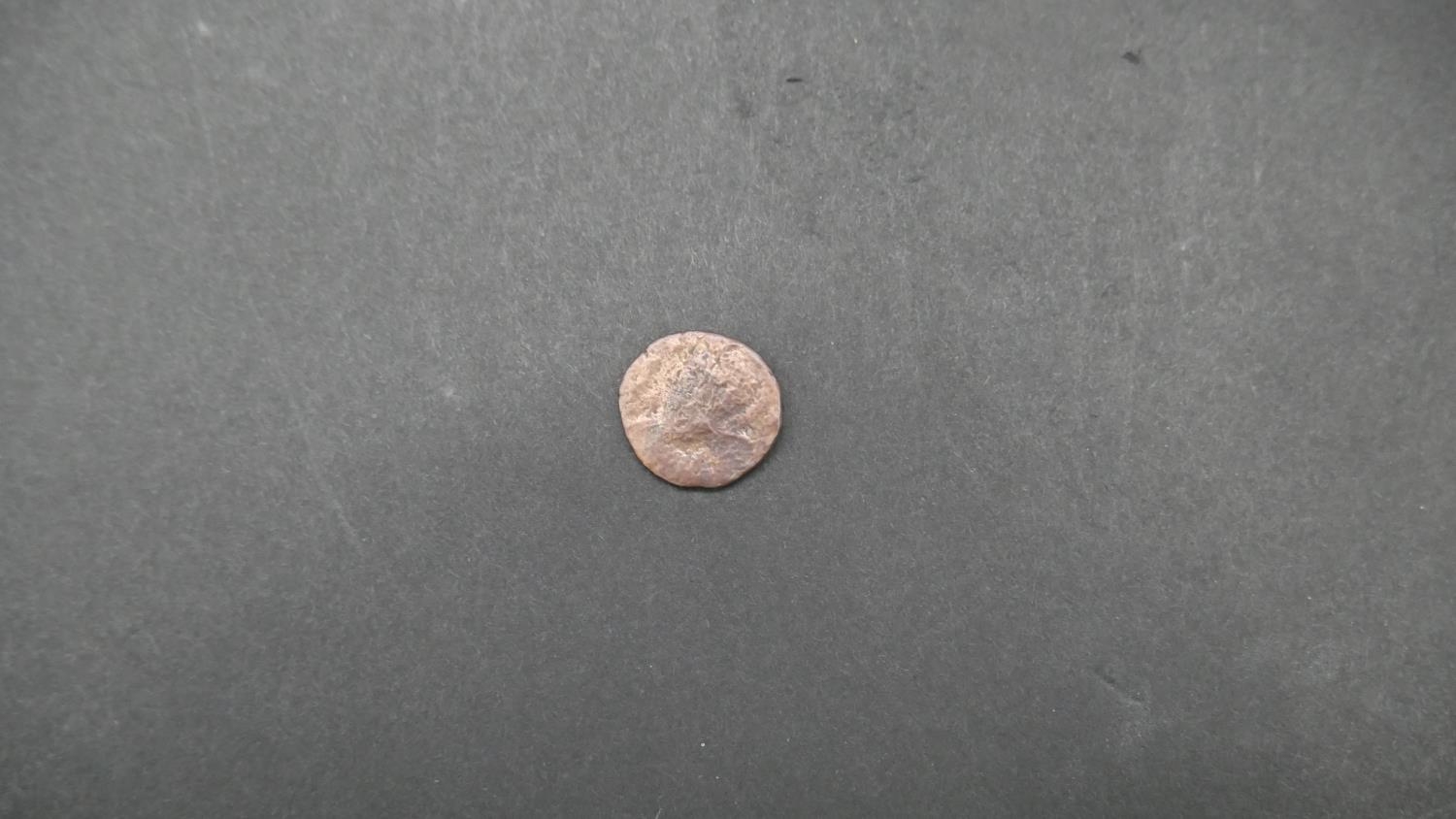 Four ancient Roman coins. Including an ancient roman silver coin depicting Securitas seated on a - Image 9 of 9