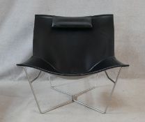 David Weeks for Habitat, a Semana tub chair in leather on a steel frame. H.79cm