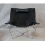 David Weeks for Habitat, a Semana tub chair in leather on a steel frame. H.79cm