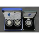 Three Royal Mint silver proof 50p coins. Including a cased set of two silver proof piedfort 50 pence