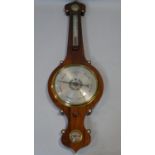 A 19th century rosewood cased banjo barometer with silvered dial by Carman, Harlestone H.103 W.31cm