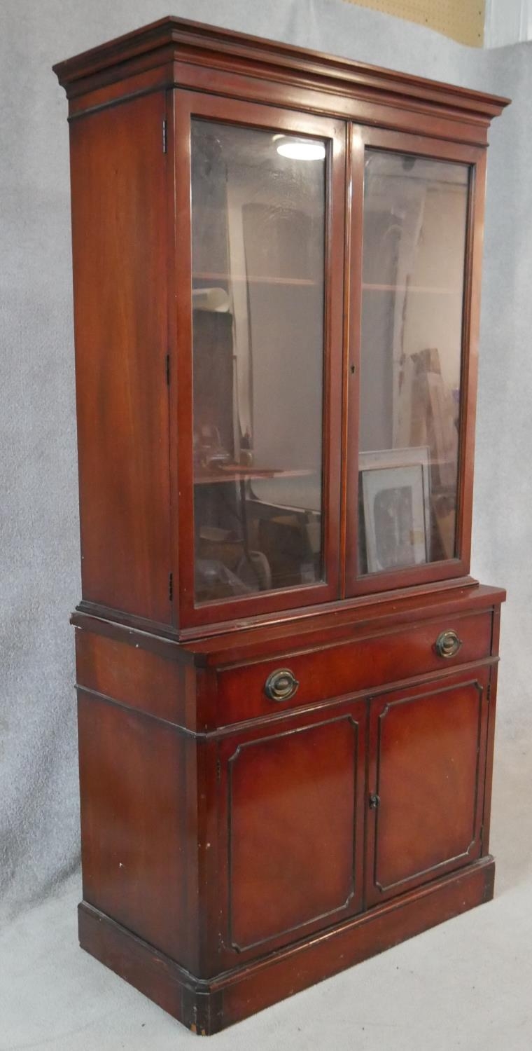 A Georgian style mahogany library bookcase with glazed doors enclosing shelves above frieze drawer - Image 6 of 6