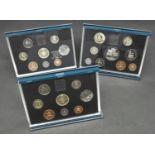A collection of three sets of proof coins. Including a 1996 Royal Mint Proof et including the