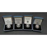 Four Royal Mint cased silver proof pound coins. Each in pale blue presentation case with COA.