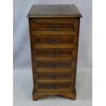 A Georgian style burr walnut and crossbanded small chest of six drawers on bracket feet. H.88 W.44