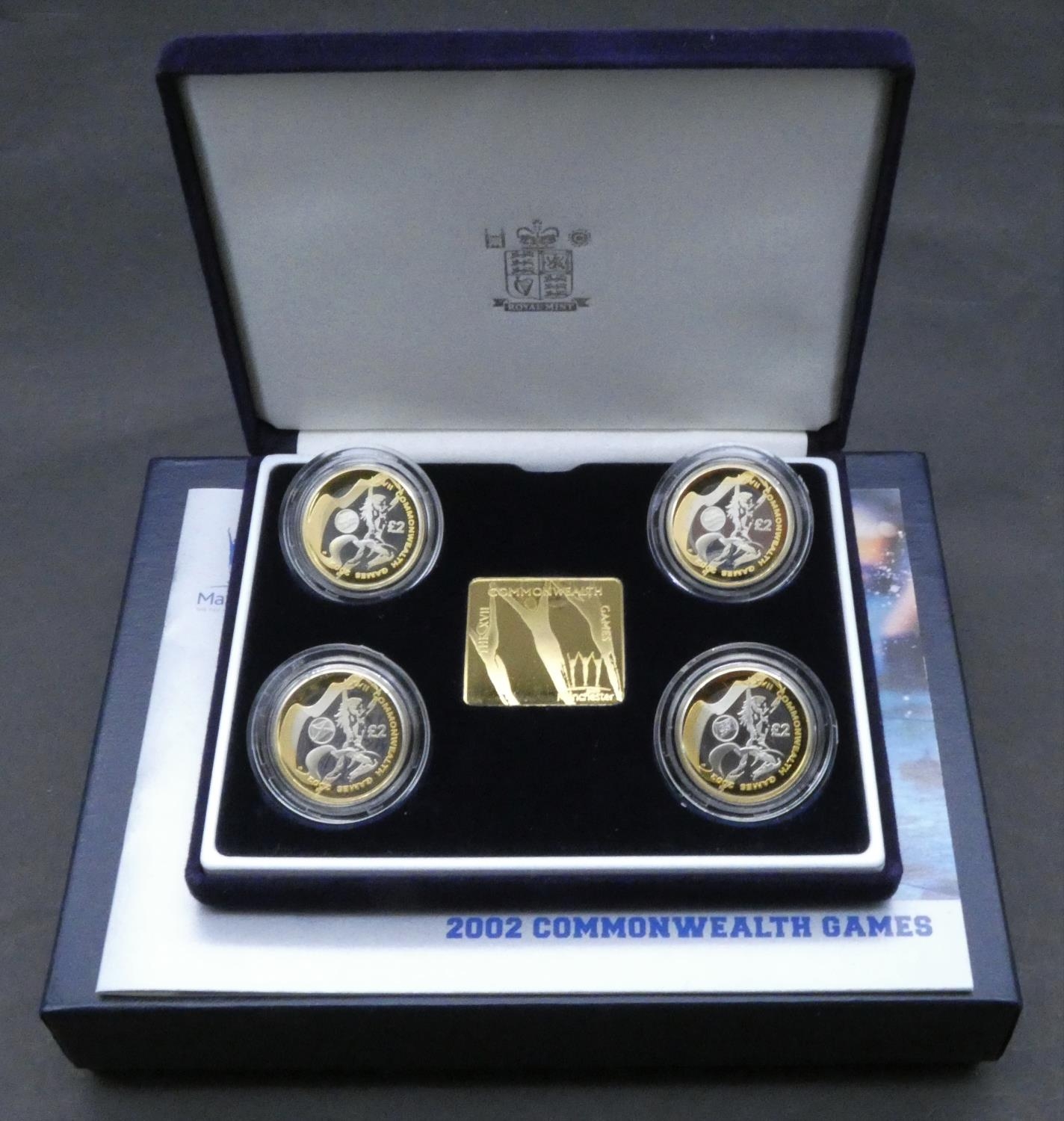 A boxed GB Royal Mint 2002 Commonwealth Games Manchester four £2 silver proof commemorative coin set