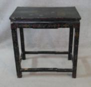 A 19th century Chinese lacquered occasional table with painted still life to the top on square