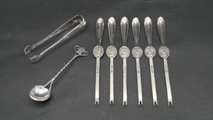 A collection of silver and silver plate. Including a set of six EPNS lobster picks, with lobster