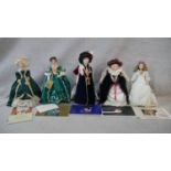 A collection of fourteen porcelain headed Franklin Heirloom Dolls, boxed and with paperwork. H.