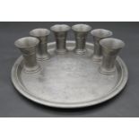 A vintage pewter tray and six matching beakers bearing the Touring Club of Switzerland crest with