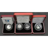 Four Royal Mint piedfort silver proof 50 pence coins. Including a UK 150 years Public Library silver
