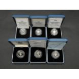 Six Royal Mint one pound silver proof coins. All in pale blue presentation cases, including 1999,