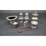 A miscellaneous collection of silver plated table items, salt, mustard pot, shakers etc. H.12cm