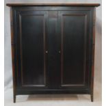 A Chinese lacquered wardrobe fitted for hanging space with faux bamboo frame and supports. H.175 W.