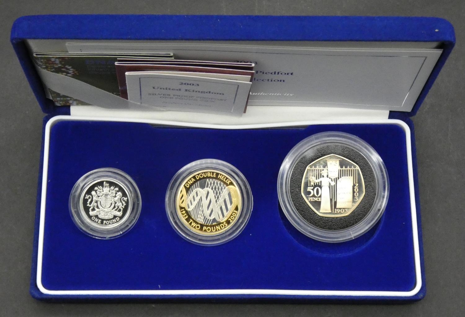 A cased 2003 Silver Proof Piedfort Collection comprising Two Pounds 2003 DNA Proof, One Pound 2003