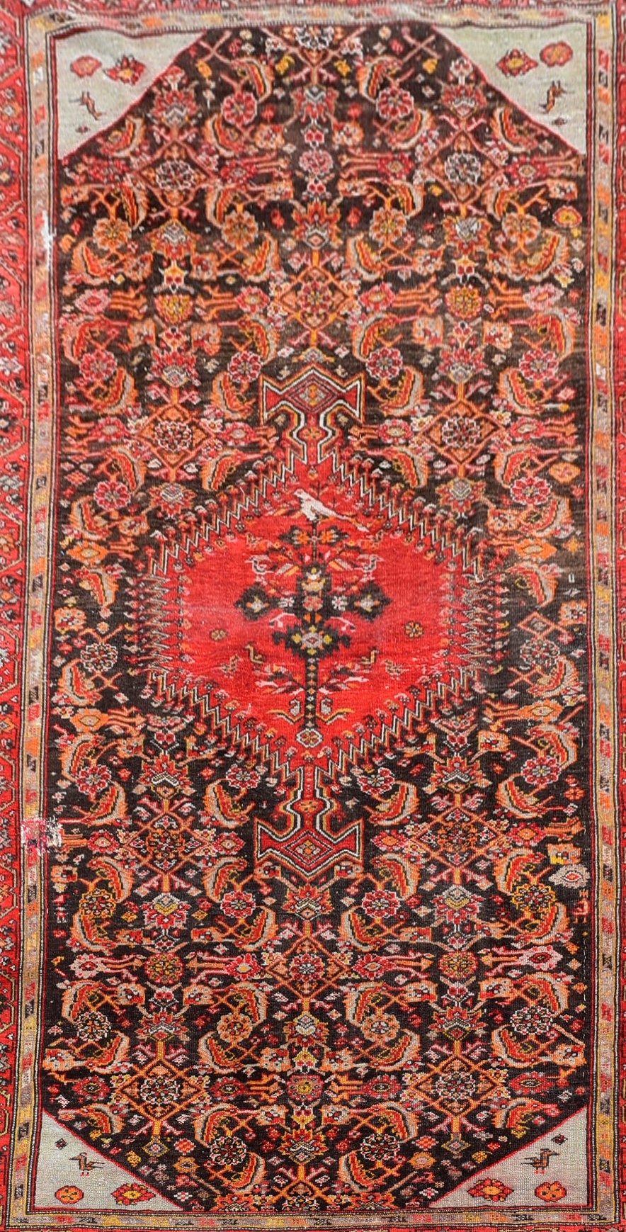 An antique Persian Malayer carpet with central hooked pole medallion on a stylised floral field - Image 2 of 6