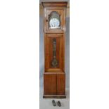 An imposing late 19th century French Provincial chestnut cased Comptoire longcase clock with