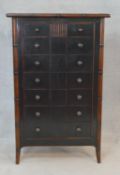 A Chinese black lacquered tall chest with faux bamboo style frame and swept supports. H.123.5 W.79