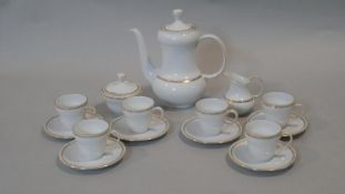 A Seltmann Weiden Bavaria porcelain coffee set for six. Each piece with a gilded foliate garland