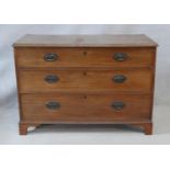 A Georgian mahogany chest of three long graduated drawers with original handles on bracket feet. H.