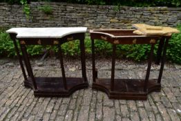 A pair of French Empire mahogany console tables with marble tops and classical motif ormolu mounts