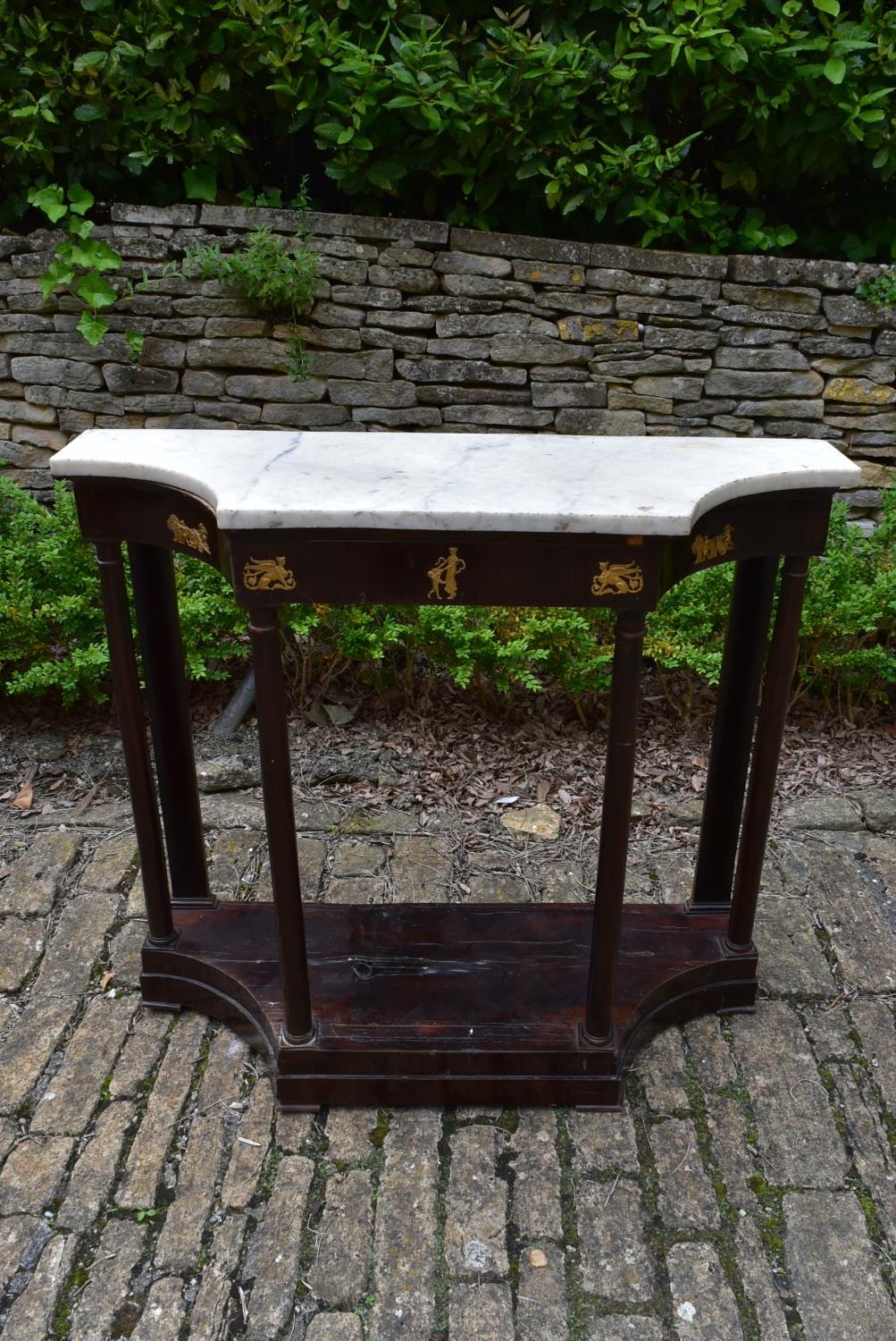 A pair of French Empire mahogany console tables with marble tops and classical motif ormolu mounts - Image 4 of 10