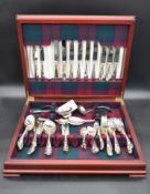 A silver plated canteen of cutlery by Arthur Price in fitted inlaid mahogany box. Twelve piece