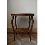 A late Victorian rosewood centre table with central floral spray inlay on shaped cabriole supports