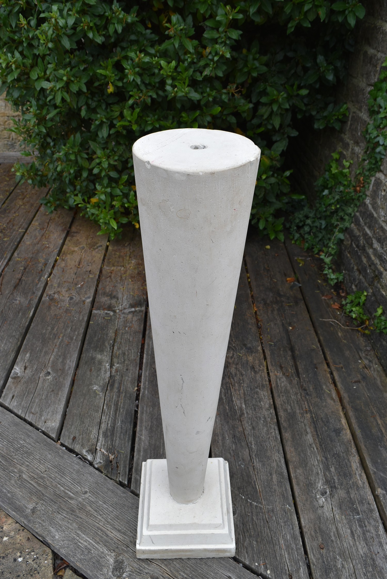 A tall stone tapering plinth on stepped base. H.105cm - Image 2 of 4