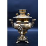A brass twin handled hot water urn. H.40cm W.32cm