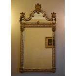 An early Georgian style pier mirror with Rococo shell cresting and with the plate flanked by