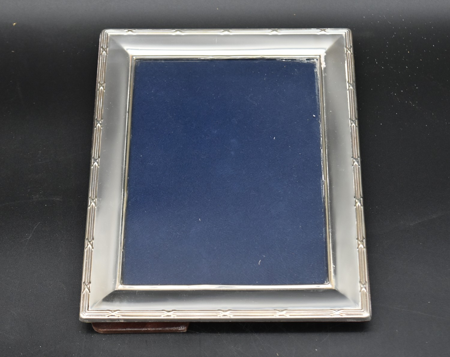 A collection of four silver easel picture frames each bearing an English hallmark. H.30cm W.25cm ( - Image 4 of 9