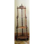 A Victorian burr walnut and satinwood floral inlaid four tier corner whatnot on turned supports. H.