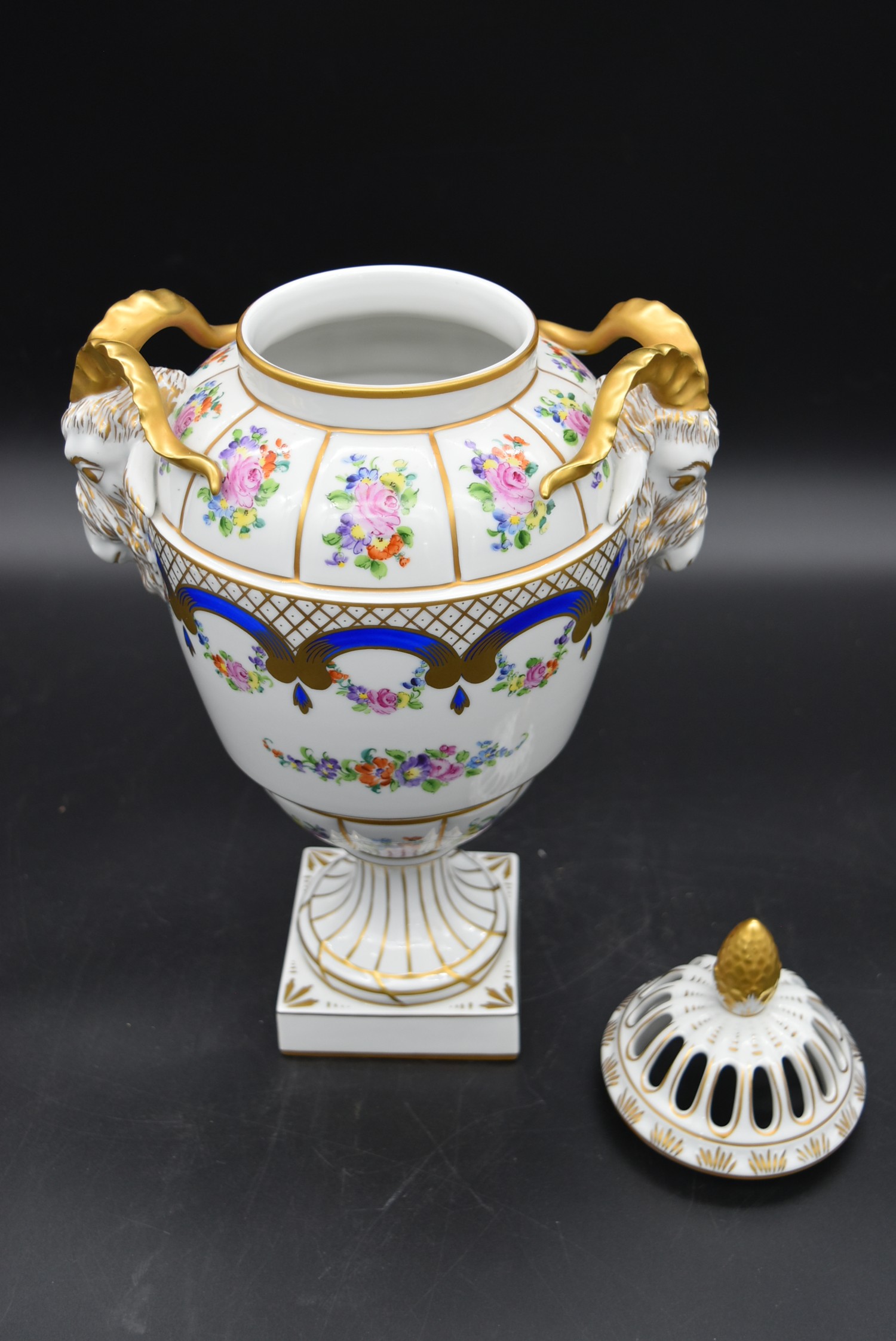 A Dresden neo classical style hand gilded and decorated lidded urn with twin ram's head handles - Image 4 of 7