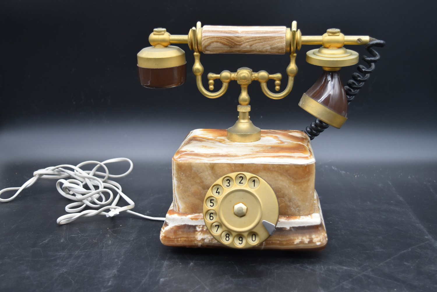 An alabaster and brass telephone in the antique style and a vintage green telephone cased in a - Image 2 of 13