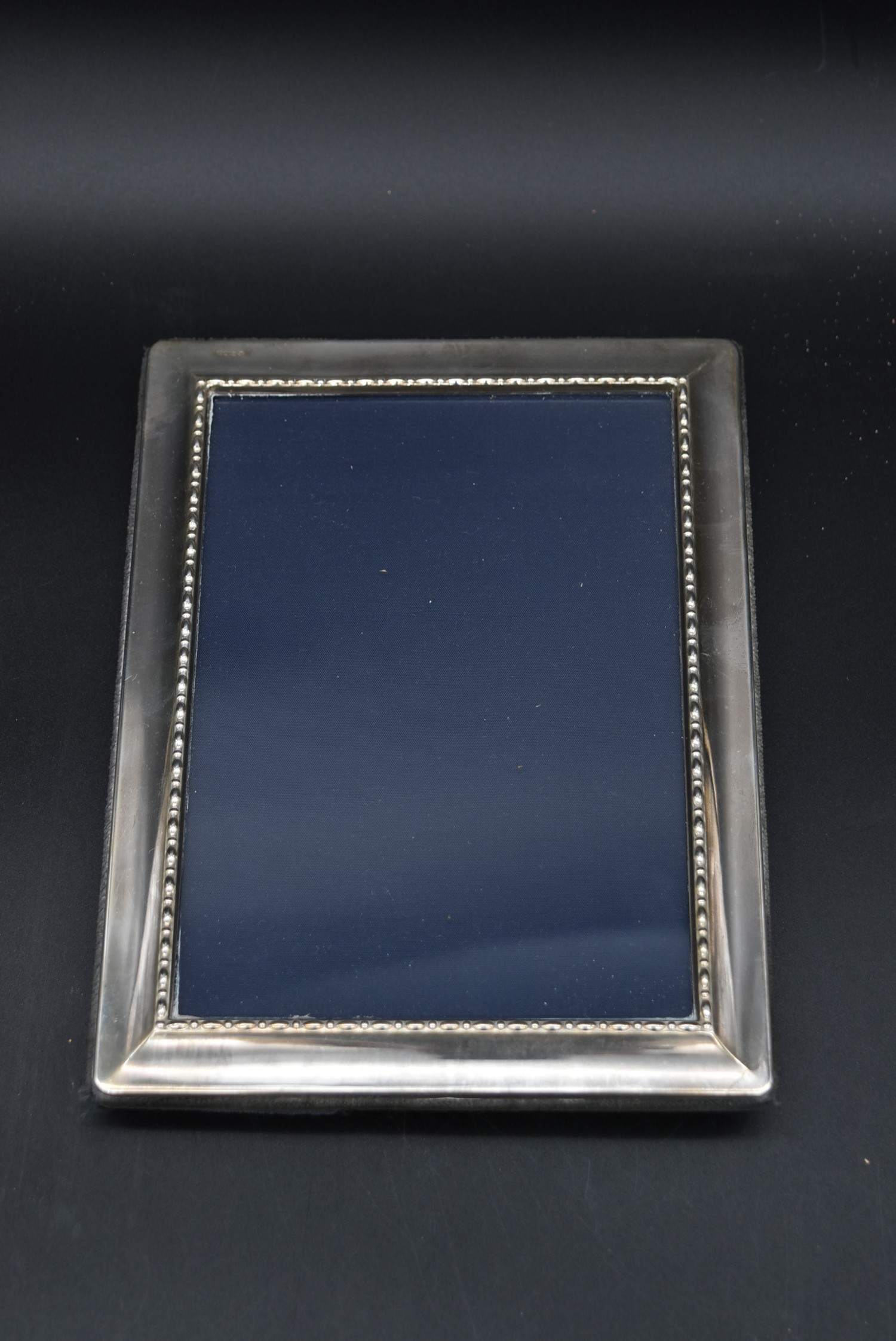 A collection of four silver easel picture frames each bearing an English hallmark. H.30cm W.25cm ( - Image 8 of 9