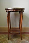 A 19th century Louis XV style walnut lamp table or urn stand with shaped brass bound marble top on