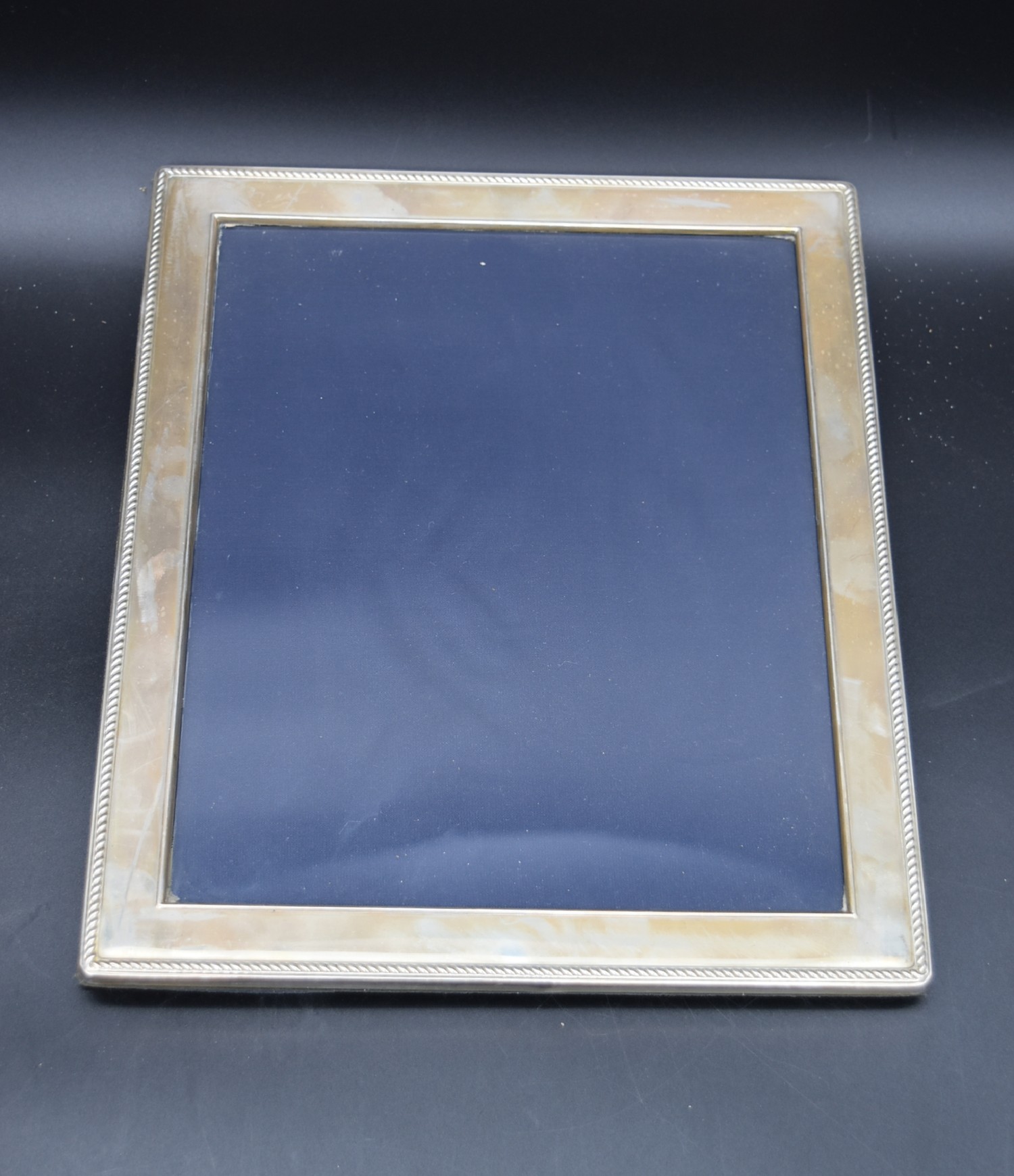 A collection of four silver easel picture frames each bearing an English hallmark. H.30cm W.25cm ( - Image 2 of 9