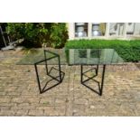 An Italian dining table with plate glass top on metal trestle style supports. L.200 H.70 W.90cm